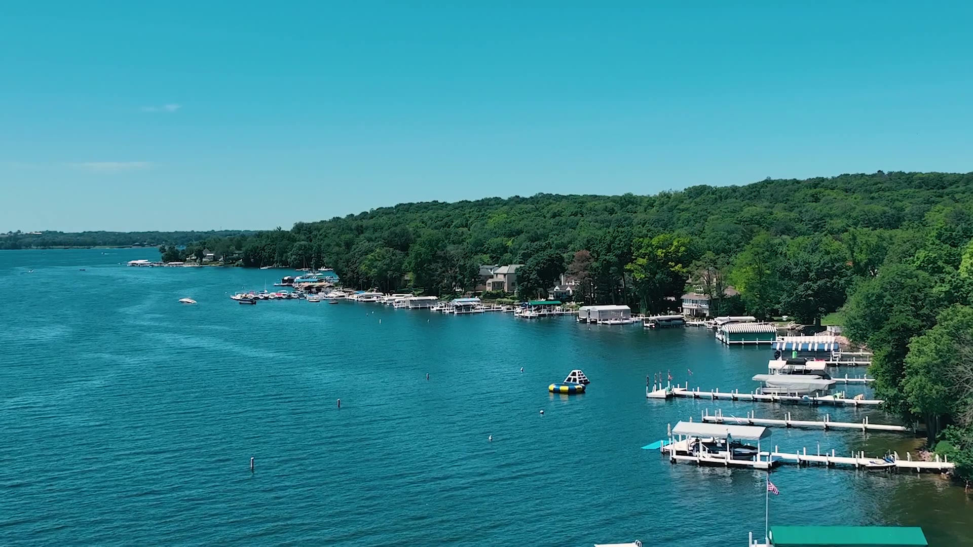 Aerial view of Geneva Lake shoreline and piers